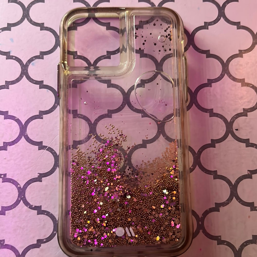 used gold glittery phone case. size xs